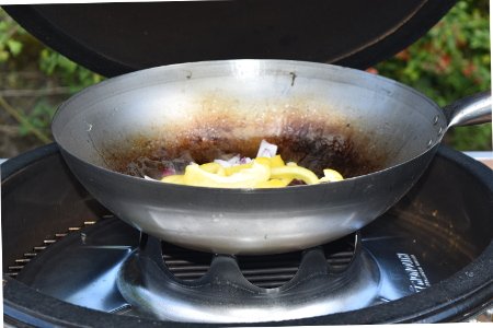 Sweet and sour tofu stir-fry veg cooking away in the wok on the Monolith barbecue