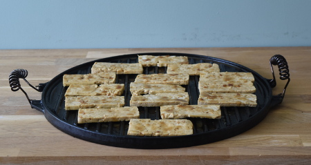 Tofu jerky on the plancha ready to smoke